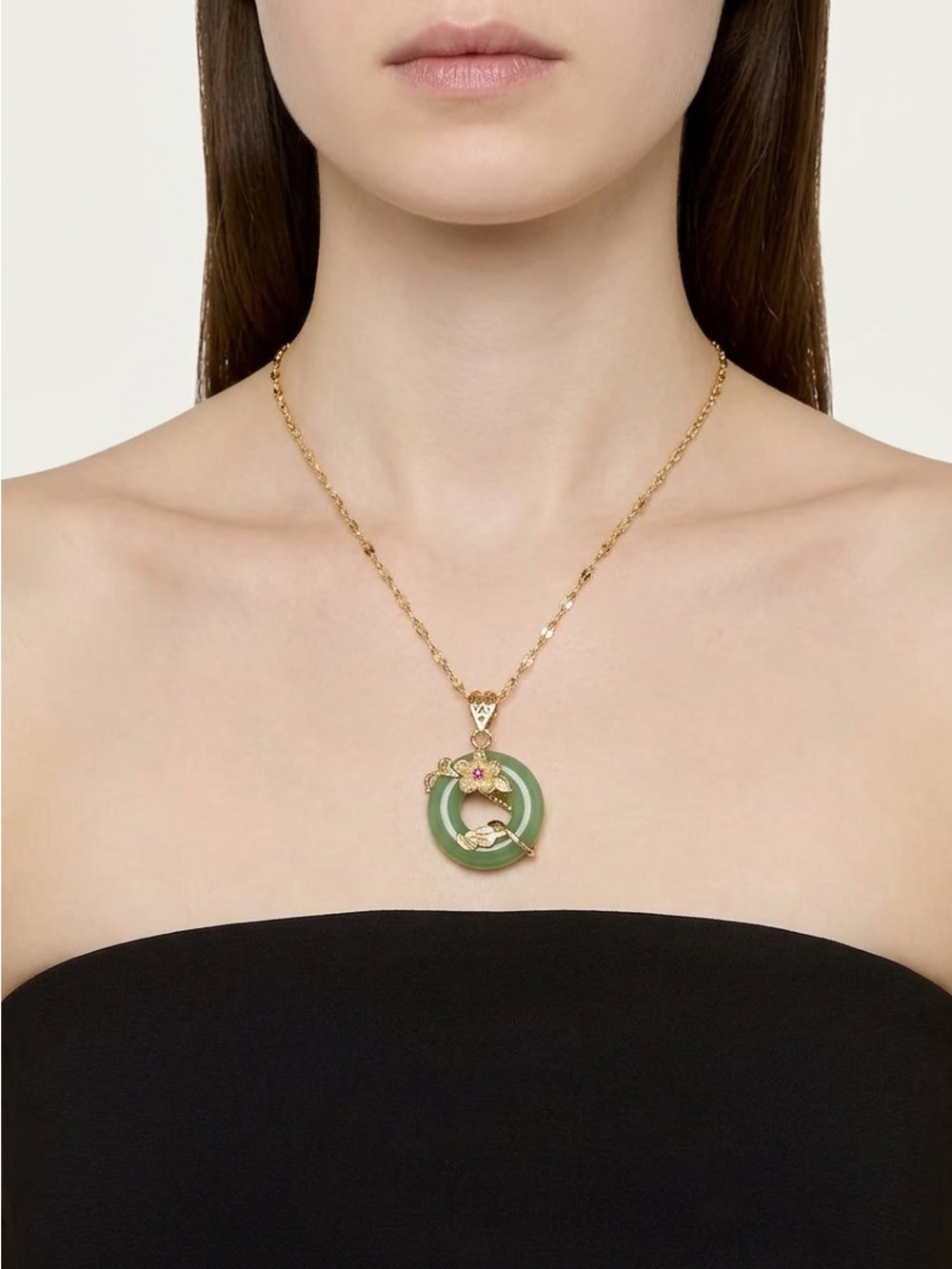 Gold-Tone Necklace with Green Jade Circular Pendant and Floral Accent